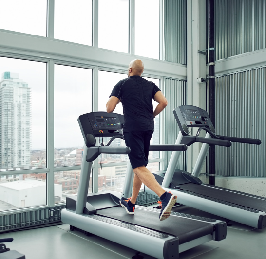 Man Running On Treadmill