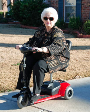 Lady on lightweight Senior Citizen's Electric Mobility Scooters