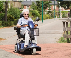 Senior on Small 3 wheeler mobility scooter