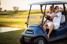 Seniors in golf cart
