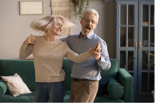 2 Seniors dancing: Senior dance therapy in action