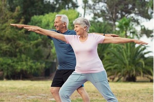 Senior couple practicing their Yoga for better health